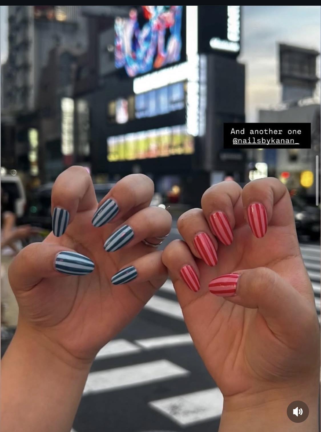 Striped red and blue glossy manicure